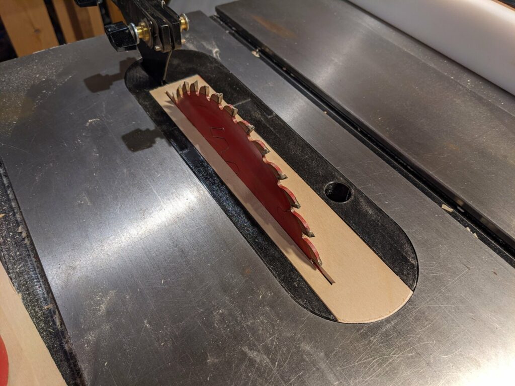 3D printed tablesaw throat insert, installed in the tablesaw