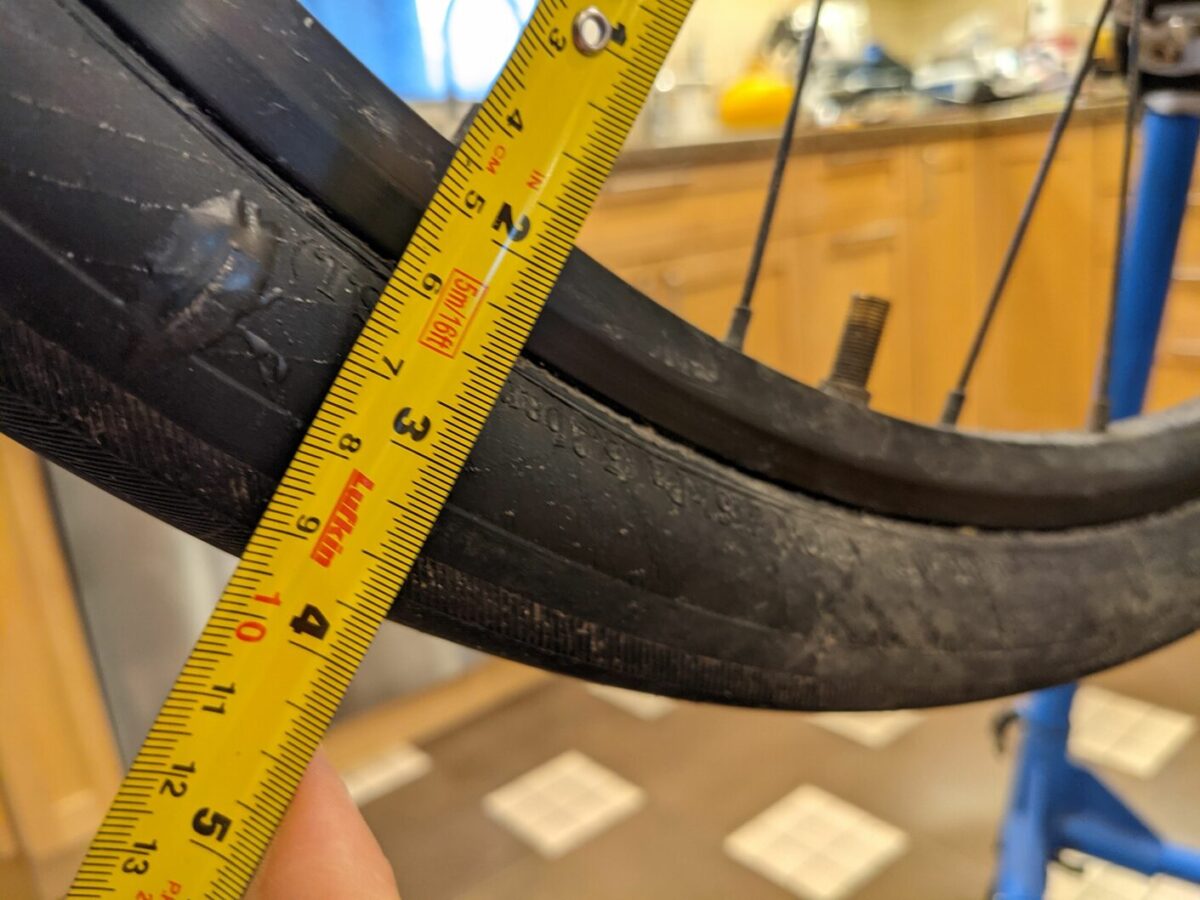 Repaired sidewall on a tubeless bicycle tire.
