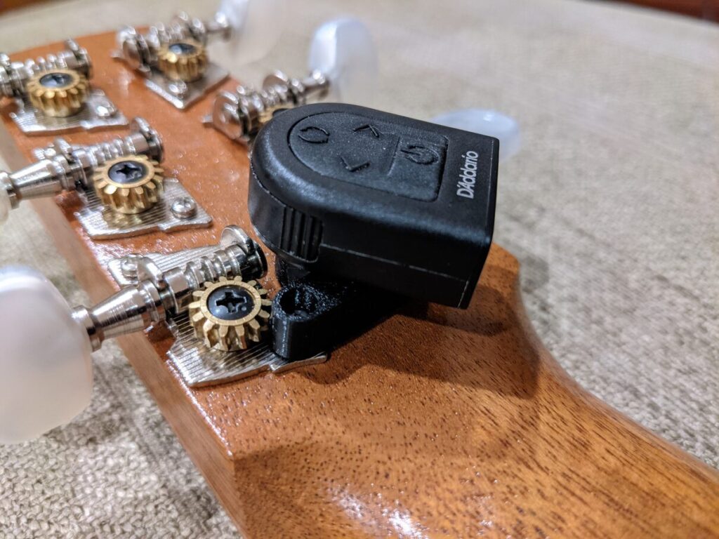 Custom Neck Mount for D'Addario Planet Waves Clip Free PW-CT-21 Guitar Tuner installed with a custom mount